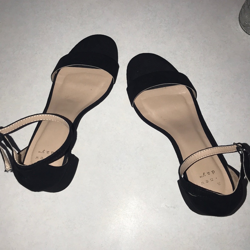 Black velvet high heels.